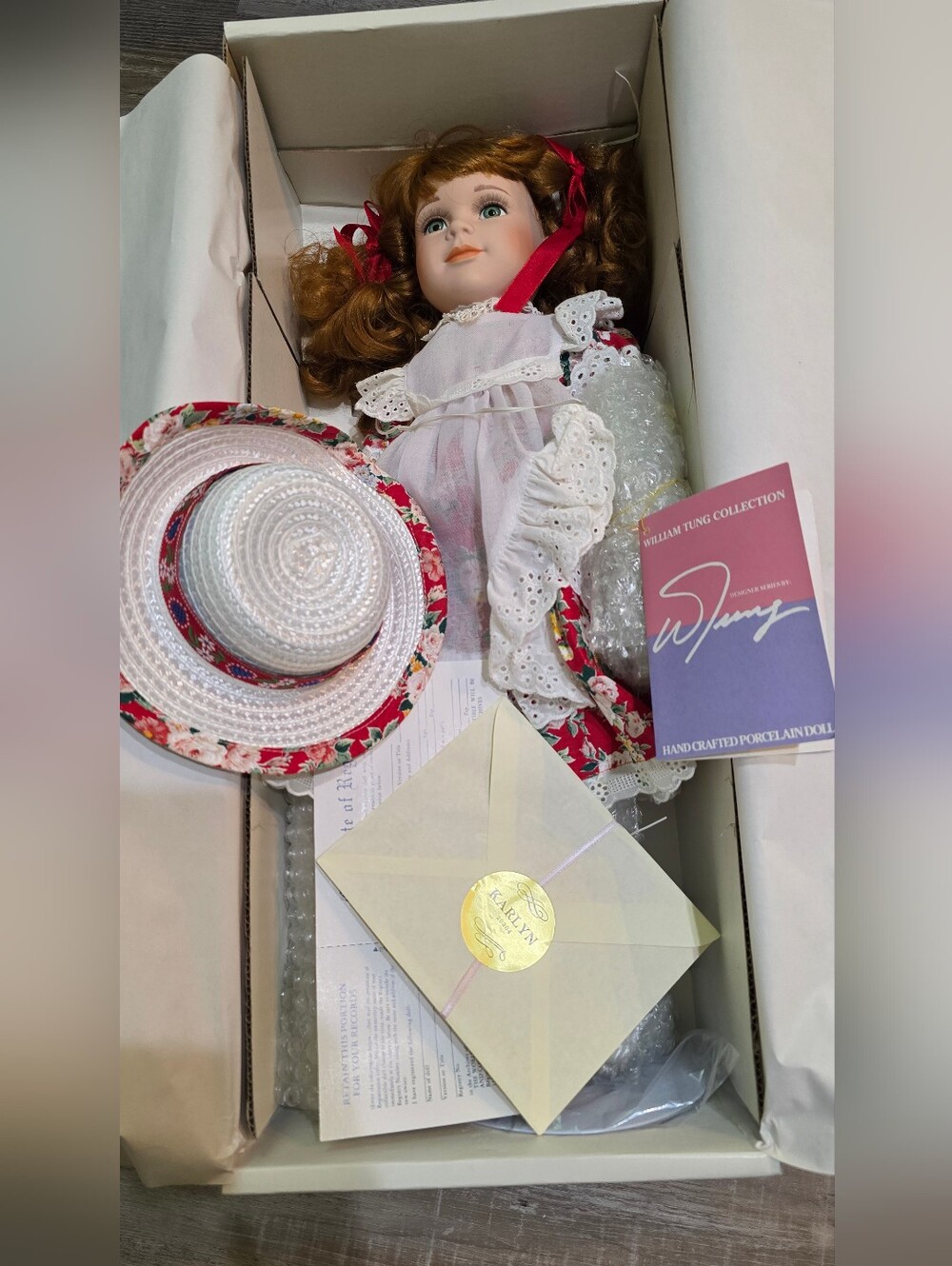 William Fung Collection Porcelain Doll with Floral Straw Hat - White & Red